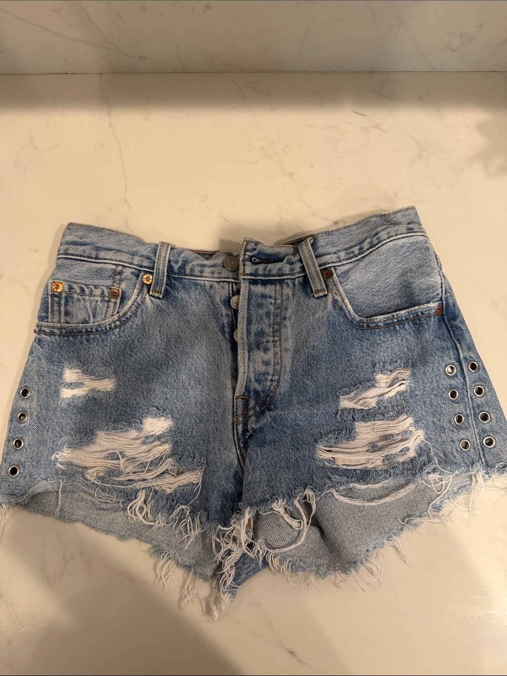 Levi’s Eyelet Distressed Denim Shorts